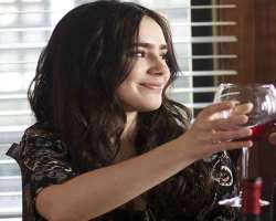Lily Collins consuming alcohol